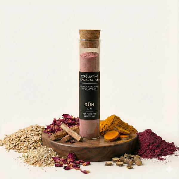 Exfoliating facial scrub in a tube with natural ingredients on a white background