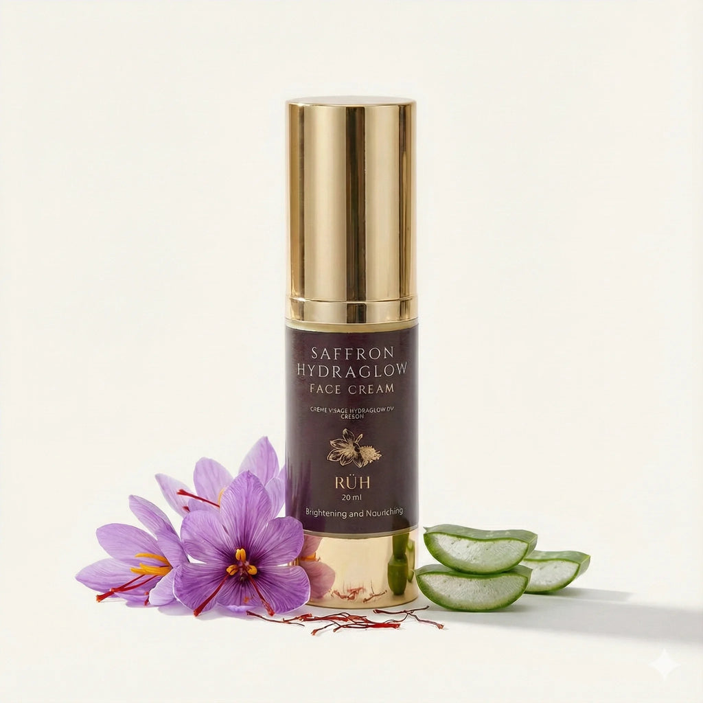 Saffron Hydraglow face cream bottle with saffron flower and aloe vera slices on a white background