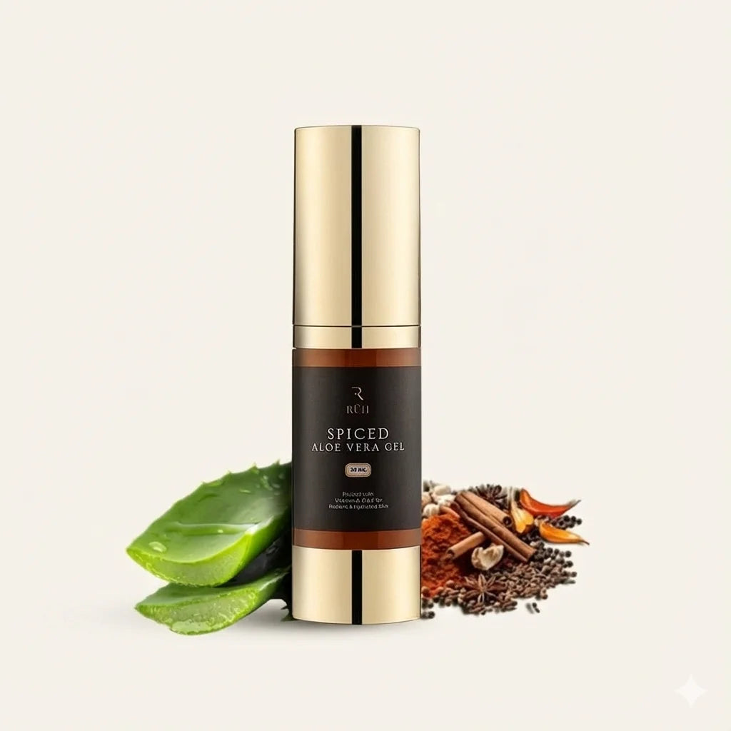 Spiced aloe vera gel bottle with aloe vera leaves and spices on a beige background
