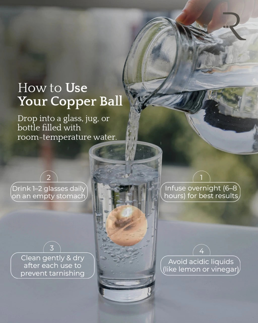 Copper ball being infused into a glass of water with usage instructions.