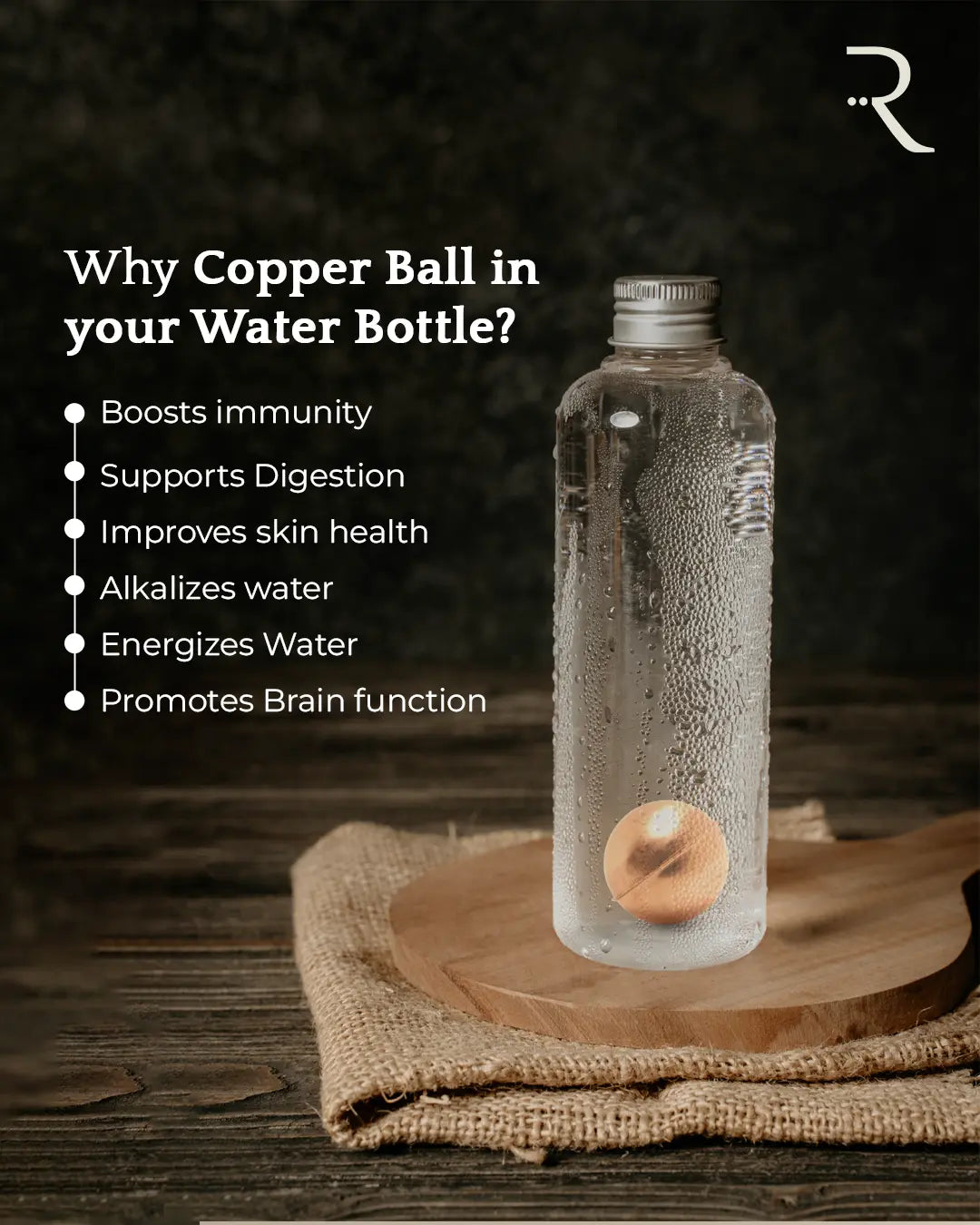 Copper ball in a water bottle with benefits listed on a dark background
